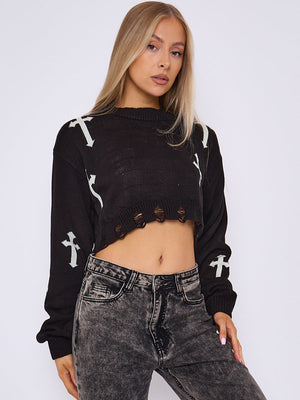 Black knitted crop jumper with white crucifix prints, ribbed crew neck and cuffs