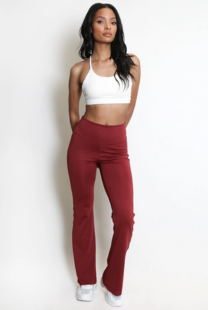 Aliyah ruched push-up flare trousers in wine red, front view