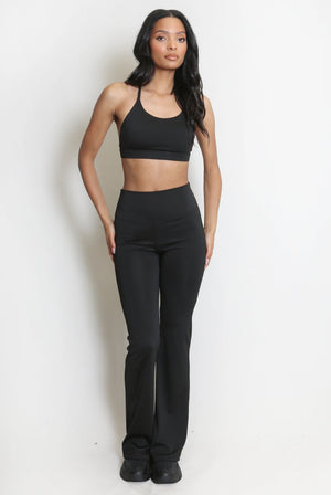 Ruched push-up flare trousers, black, front view with fitted waist and wide flare