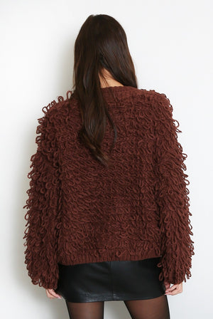 Brown loop-knit cardigan with textured loop yarn and long sleeves, back view