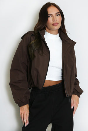 Brown hooded cropped jacket with front zipper and elastic sleeve cuffs
