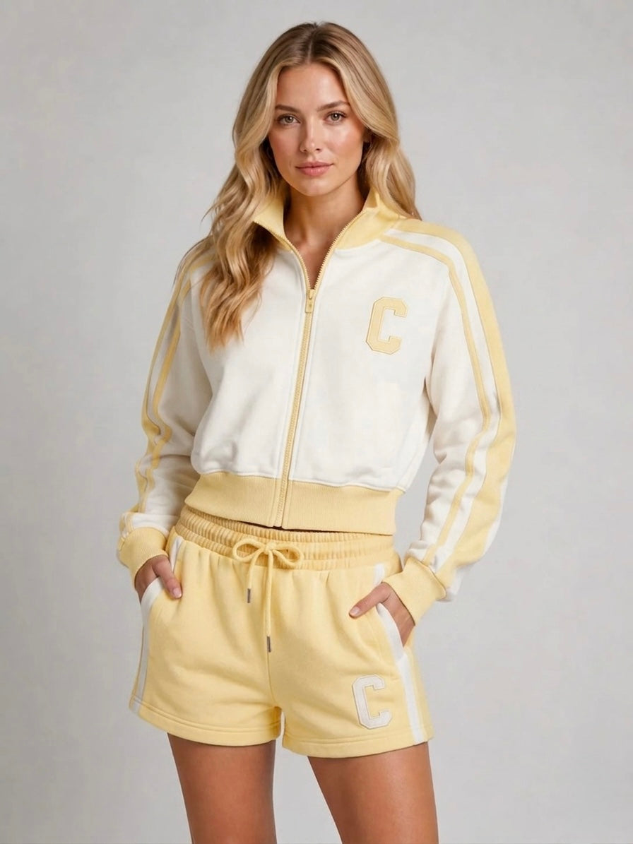 Yellow fleece zip-up jacket and shorts set with C patch, side stripes, drawstring waist