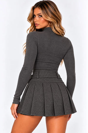 Grey houndstooth pleated mini skirt with belt and front buckle