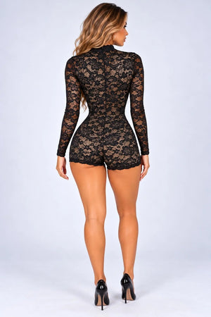 Black floral lace playsuit with long sleeves and fitted shorts, rear view