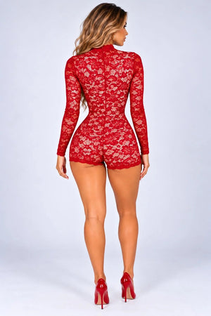 Red floral lace playsuit with long sleeves and fitted shorts, rear view