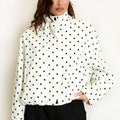 Cream polka dot lightweight jacket with long sleeves, stand collar and zip front