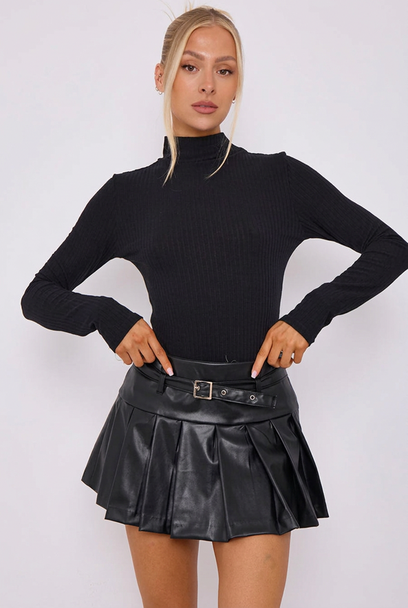 Black faux-leather pleated skort with buckle belt, front view