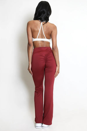 Aliyah ruched push-up flare trousers in wine red, back view