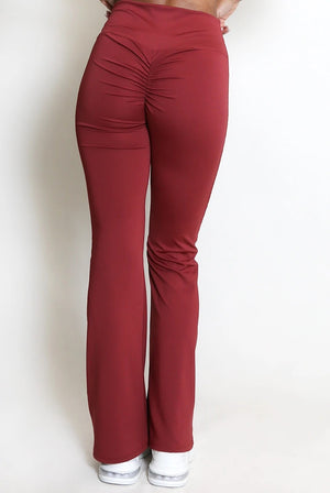 Ruched push-up flare trousers, wine red, side view with gathered hip ruching