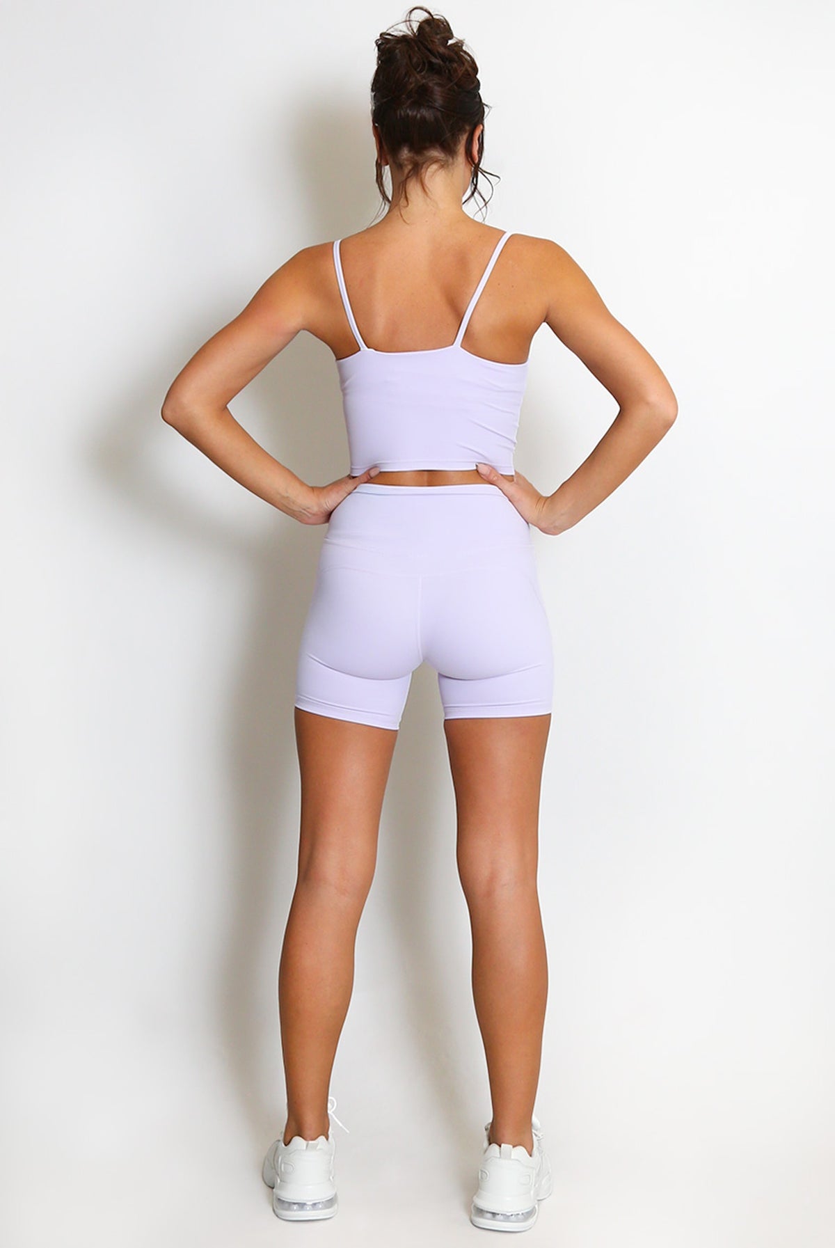 Lilac strappy crop top and matching biker shorts set, back view