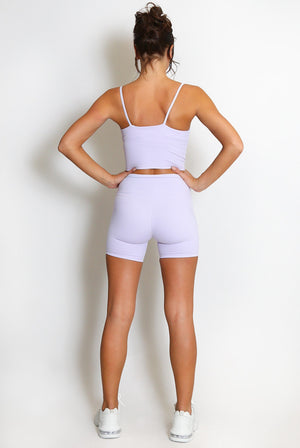 Lilac strappy crop top and matching biker shorts set, back view