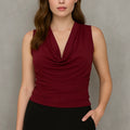 Red sleeveless cowl-neck ruched slinky top with draped neckline
