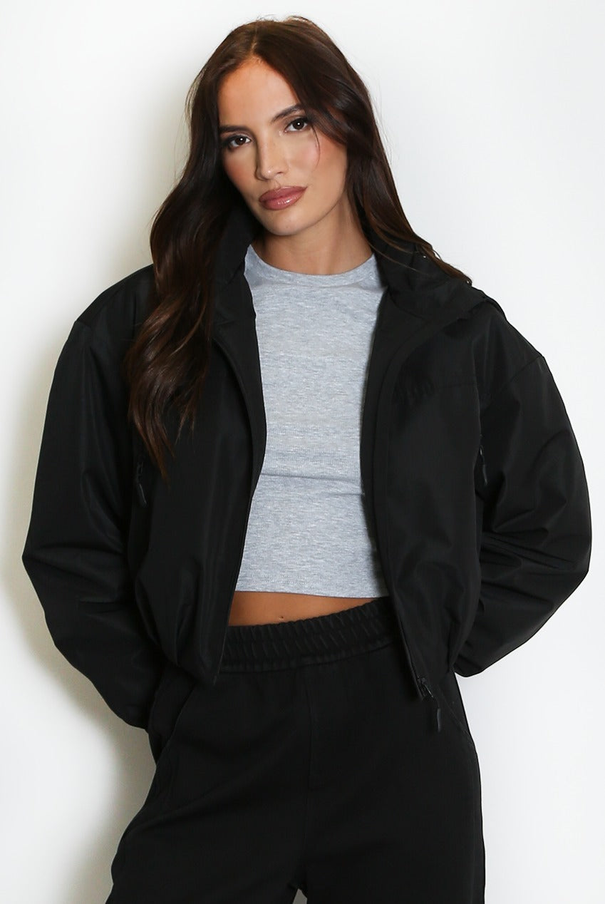 Black cropped hooded jacket with front zipper and hood