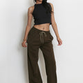 Front view dark brown elasticated wide-leg joggers with drawstring waist