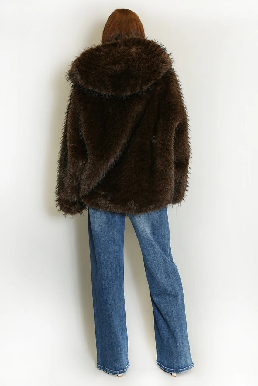 Back view of the dark brown shaggy fur coat and oversized hood