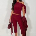 Wine two-piece set with an asymmetric tie-shoulder top and cropped tie-waist leggings