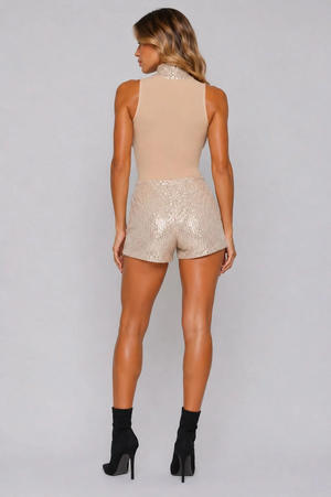 Beige sequin mesh high-neck bodysuit with matching glitter shorts, back view