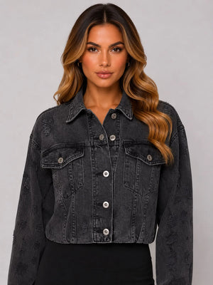 Dark gray cropped denim jacket with button front, flap chest pockets, and distressing