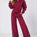 Burgundy zip-up hoodie and wide-leg track pants set with drawstring waist