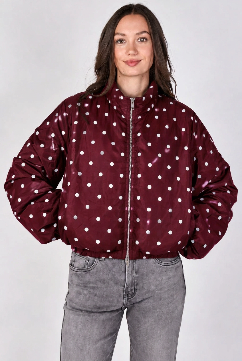 Wine lightweight jacket with white polka dots, high collar, zip front, and gathered cuffs