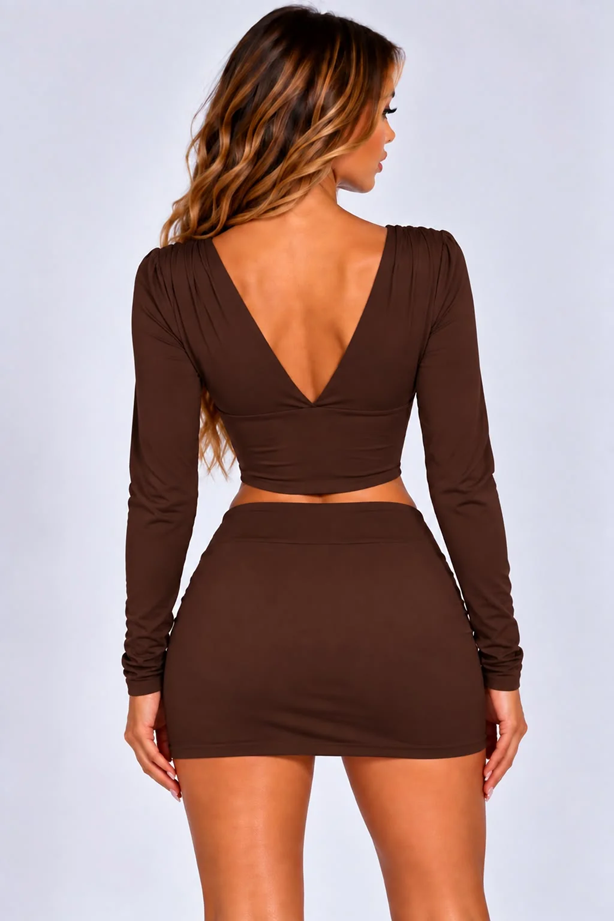 Brown plunge-back long-sleeve crop top with mini skirt co-ord set, back view