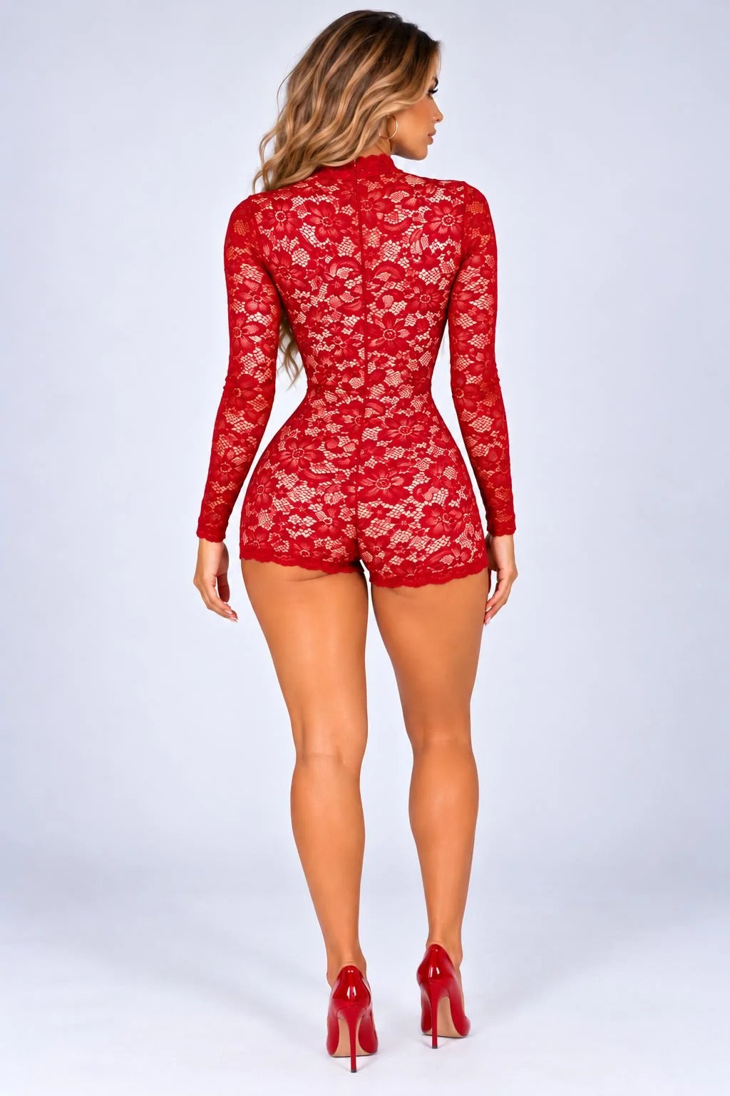 Red floral lace playsuit with long sleeves and fitted shorts, rear view