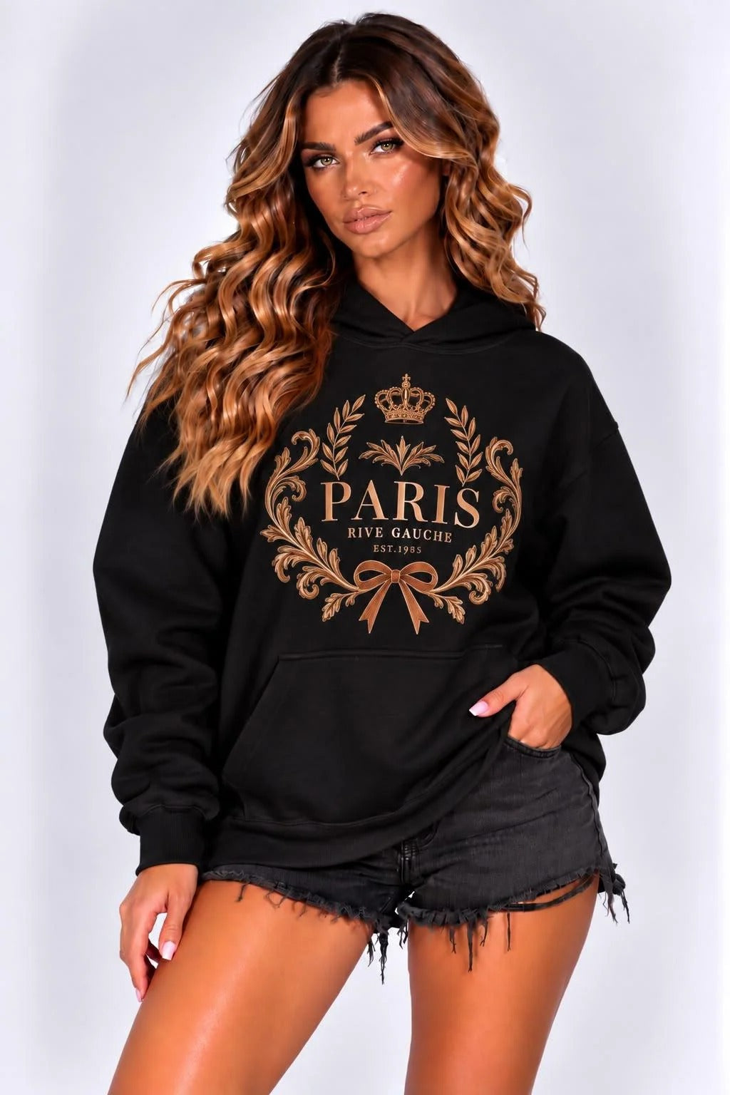 Oversized black hoodie with bronze Paris crest print, drawstring hood and front pocket