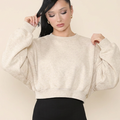 Oatmeal fleece jersey cropped jumper with a loose fit, crew neck, and dropped shoulders