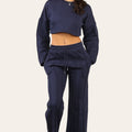 Navy long-sleeve crop top and wide-leg jogger set with drawstring waistband