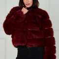 Wine faux fur zip-up jacket with high collar and chunky horizontal fur stripes