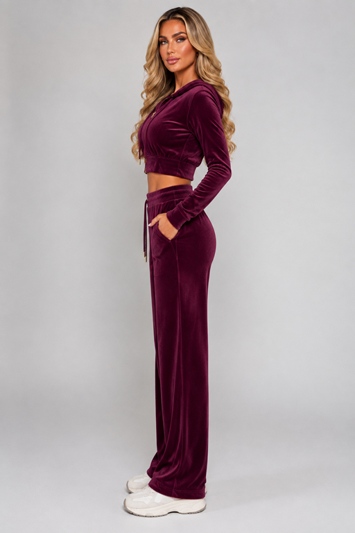 Wine velour crop hoodie and wide-leg trousers set, full body side view, zip front