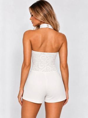 White lace halter neck bodysuit with matching high-rise shorts, open back view.