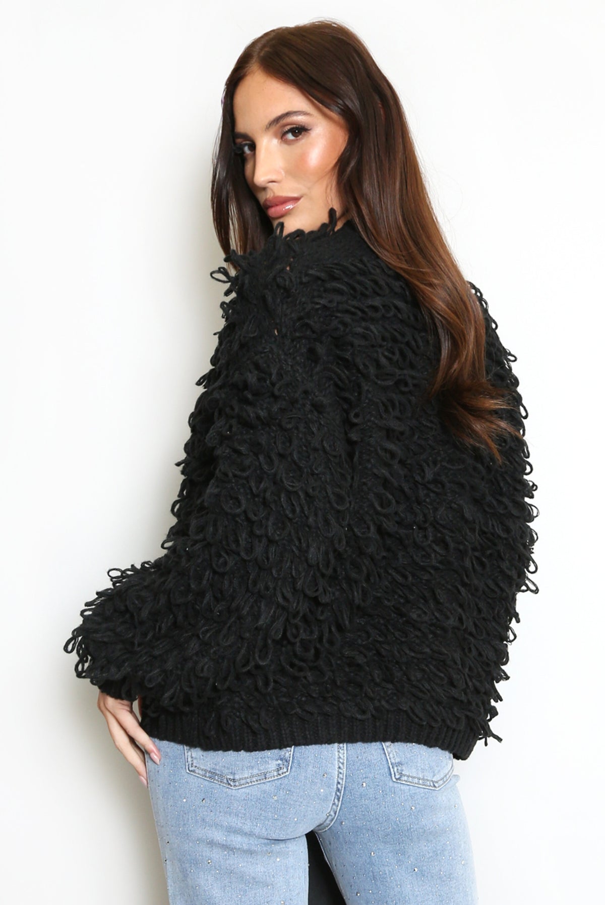 Black loop-knit cardigan with shaggy loop texture, long sleeves, button placket