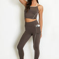 Brown/taupe gym vest and leggings set with white trim and side pocket