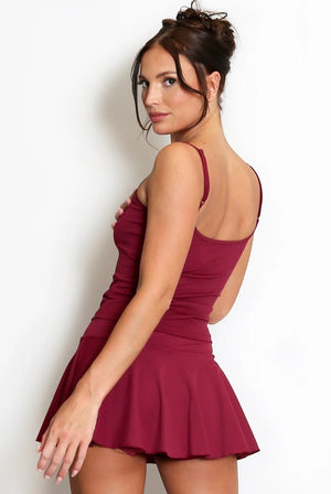 Wine cami gym top with spaghetti straps and peplum hem, fitted