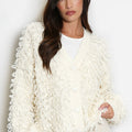 Cream loop-knit cardigan with V-neck, button front, shaggy loops, long sleeves