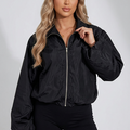 Black windbreaker jacket with front zipper, stand collar, and elastic cuffs