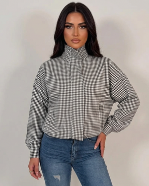 Black and white check jacket with zip front and stand collar, long sleeves
