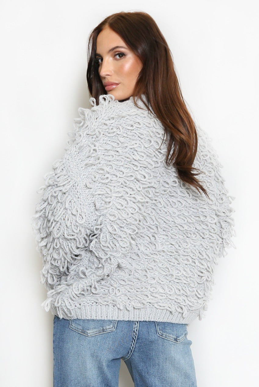 Light grey loop-knit cardigan with button front and textured loop yarn, long sleeves