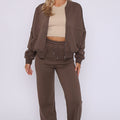 Brown fleece zip-front bomber and jogger set with elastic cuffs and drawstring waist