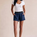 Navy contrast-waist runner shorts with elastic waistband and side pockets