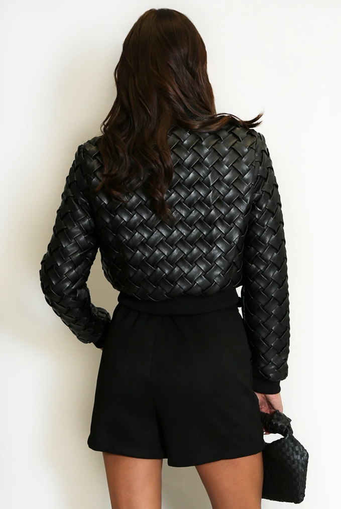 Faux leather woven bomber jacket, back view, ribbed hem and zipper, black